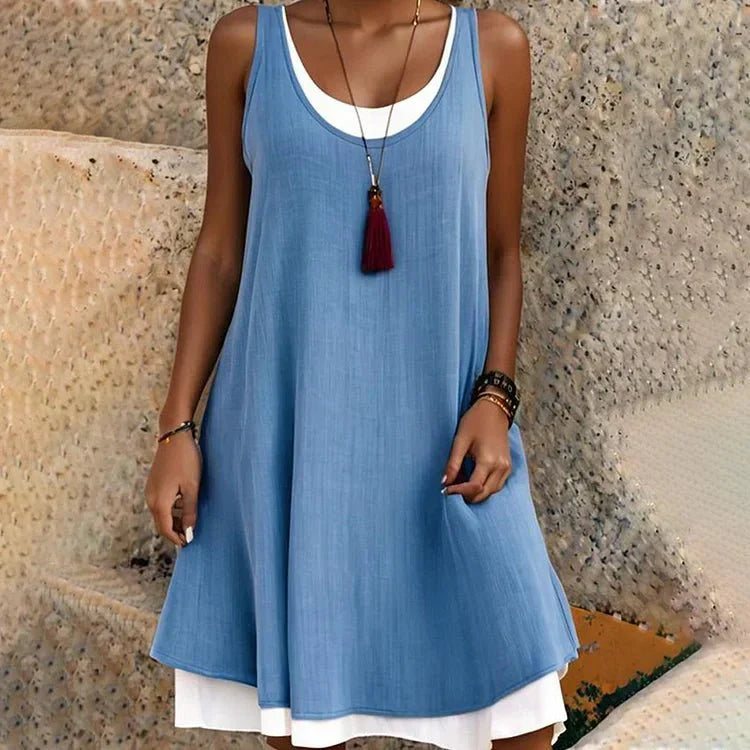 Cove | Abito midi smanicato luminoso