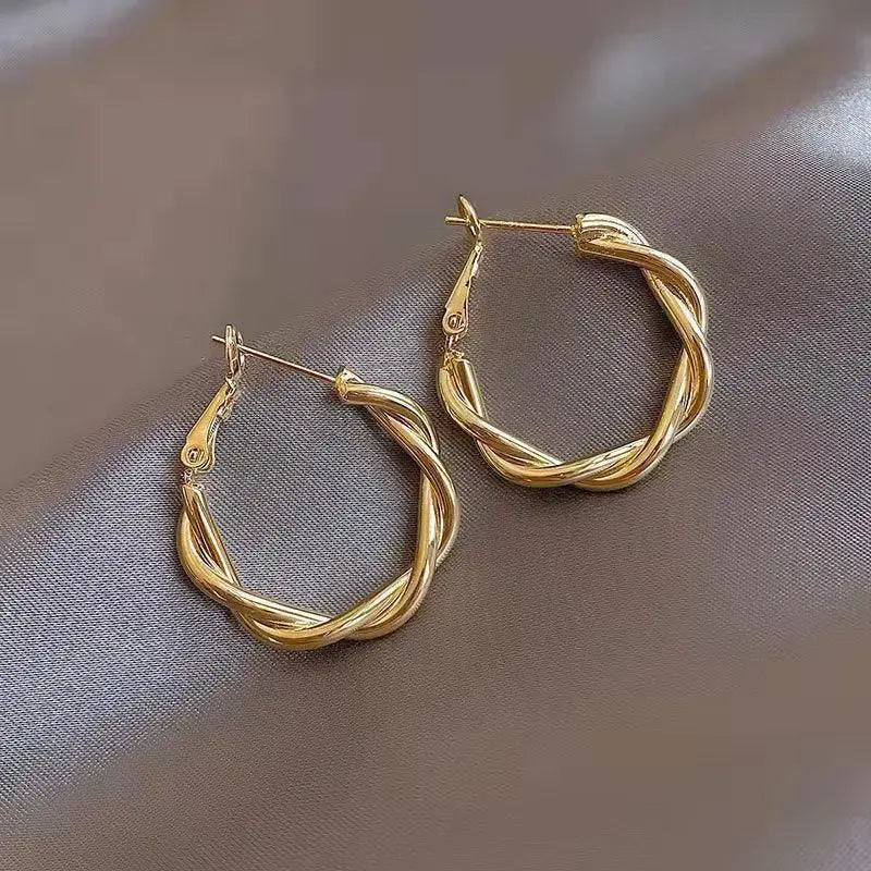 Orecchini Elegante con Nodo Dorati