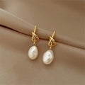 Orecchini Barocco Elegante con Perla Barocca Dorati